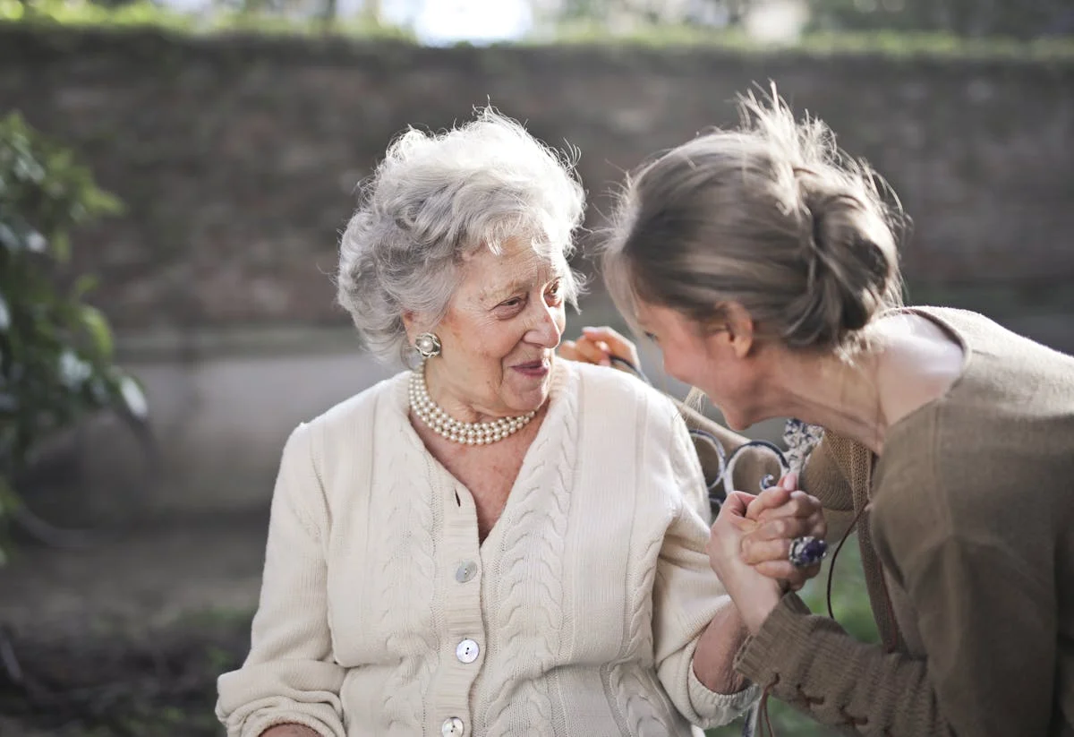 Older adult in quiet contemplation about hearing wellness